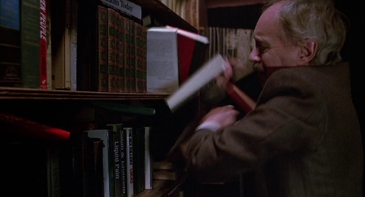 The old man's library of suspicious books.