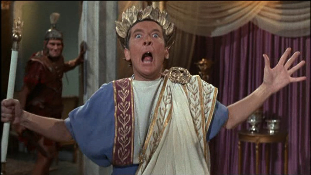 Julius Caesar, played by Kenneth Williams, facing the camera with a panicked look.