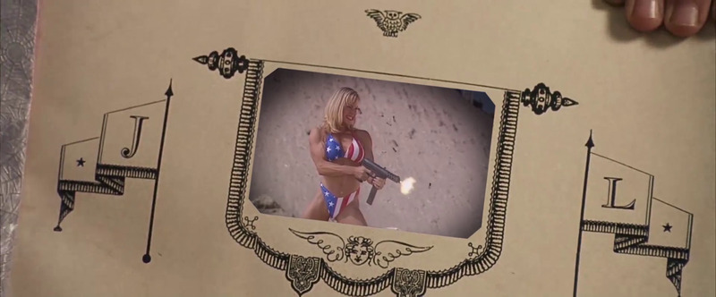 A female bodybuilder in an American flag bikini shooting a gun. Yes, this is still Harry Potter.