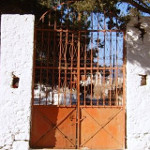 The gated entrance to the cemetery.