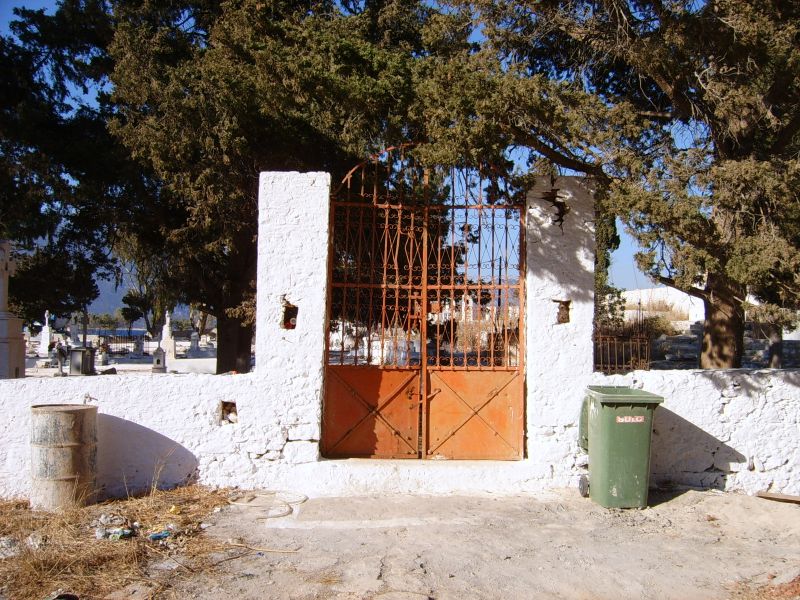 The gated entrance to the cemetery.
