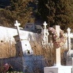 The scattered graves to the right.