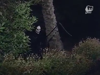 A Grim Reaper in the front garden.